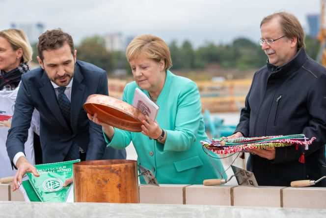 Friedrich Curtius, General Secretary of the German Football Association (DFB), Chancellor Angela Merkel, and Rainer Koch, DFB Vice President, during the laying of the foundation stone for the new DFB and its academy, the September 26, 2019 in Frankfurt.