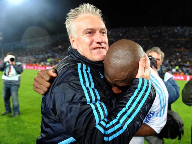 Didier Deschamps celebrates the title of champion of France with the defender Stéphane Mbia, on May 5, 2010, at the Stade-Vélodrome, in Marseille.