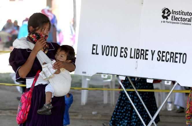 An indigenous Wixarika woman at a polling station in the community of Mezquitic, Jalisco state, Mexico, June 6, 2021.
