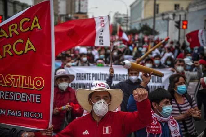 Supporters of Pedro Castillo march through Lima on June 26, 2021.