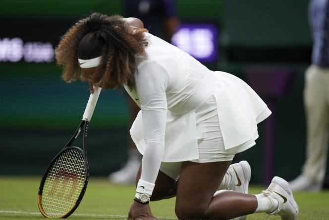 Serena Williams falls to the ground in the first round of Wimbledon in London on Tuesday June 29.