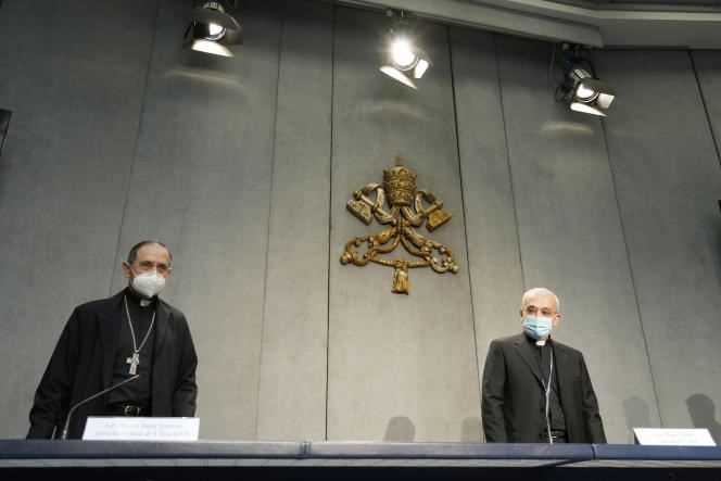 Bishop Filippo Iannone (right) and Bishop Juan Ignacio Arrieta Ochoa de Chinchetru present the changes in the canon law of the Church during a press conference in the Vatican, Tuesday, June 1, 2021.