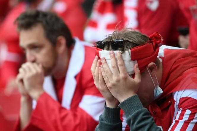 The distress of a Danish fan after Christian Eriksen's discomfort during the match between Denmark and Finland.