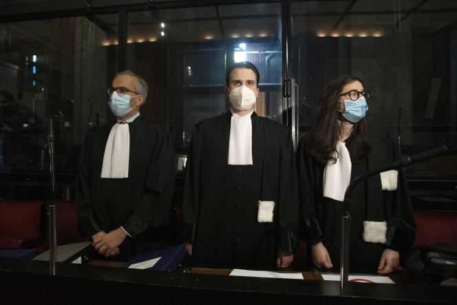 On May 26, 2021, AstraZeneca's lawyers, Hakim Boularbah (left) and Clemence Van Muylder (right), await a hearing, during the trial against the European Commission, in Brussels.