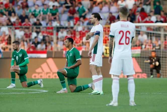 The Irish kneel before a friendly against Hungary in Budapest on June 8.