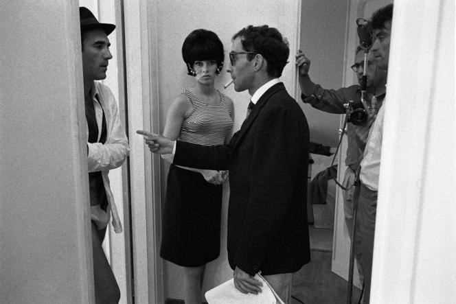 The director Jean-Luc Godard and the actors Brigitte Bardot and Michel Piccoli, on the set of “Mépris”, in 1963.
