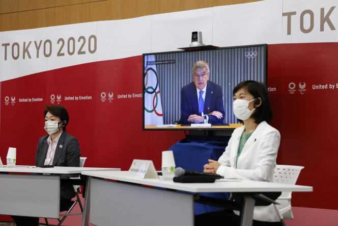 Tokyo 2020 President Seiko Hashimoto (left), Olympics Minister Tamayo Marukawa (right), and International Olympic Committee President Thomas Bach at a meeting in Tokyo on June 21, 2021.