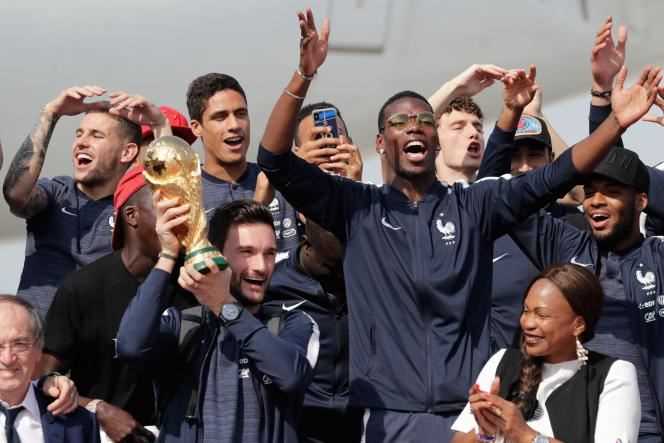 The players of the French football team upon their arrival at Roissy-Charles de Gaulle airport on July 16, 2018, after winning the 2018 World Cup final in Russia.