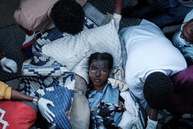 A young woman injured in the Ethiopian army bombardment of Togoga village in Tigray arrives at Mekele hospital on June 23, 2021.