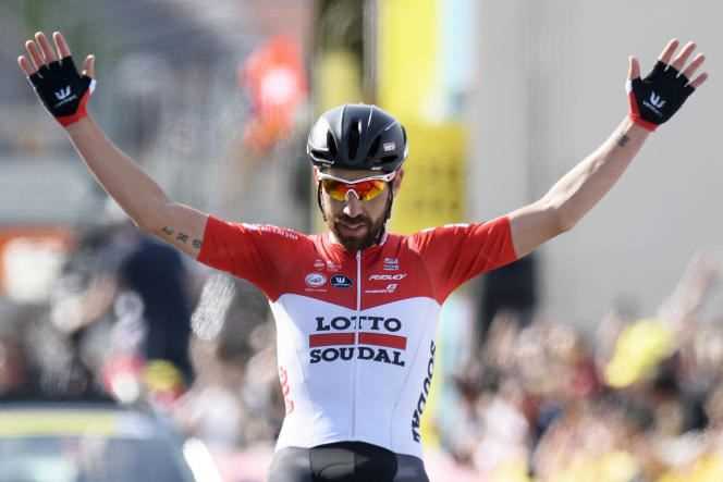 The Belgian Thomas De Gendt of Lotto Soudal raises his arms on the finish line in Yverdon after winning the second stage of the 72nd edition of the Tour de Romandie, on Thursday April 26, 2018.