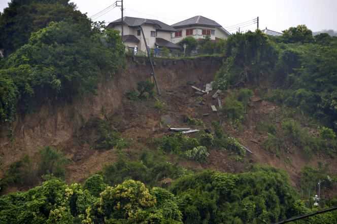 Rescuers intervene in Zushi, in Kanagawa prefecture, on Saturday July 3, 2021.