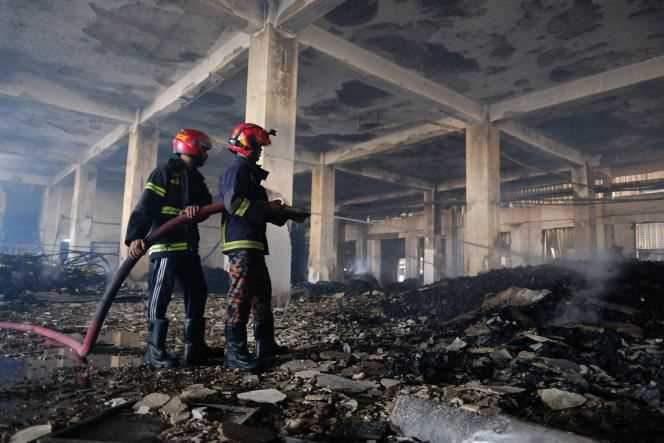 Firefighters are finishing control of the blaze inside the plant, which claimed the lives of 52 people on July 9, 2021.