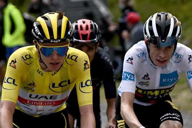 Tadej Pogacar and Jonas Vingegaard with Richard Carapaz in the background, during the 17th stage of the Tour de France, July 14, 2021.