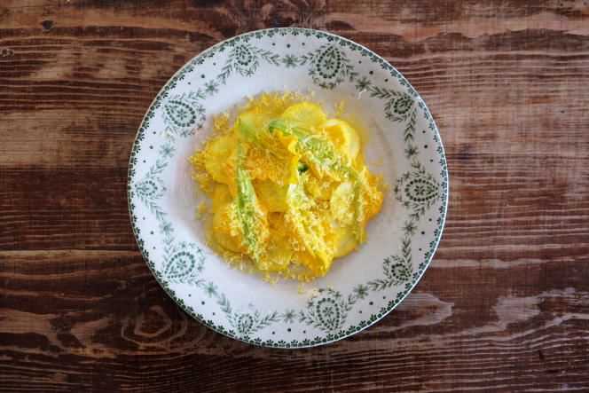 Yellow zucchini carpaccio from the garden, smoked butter and egg yolk.