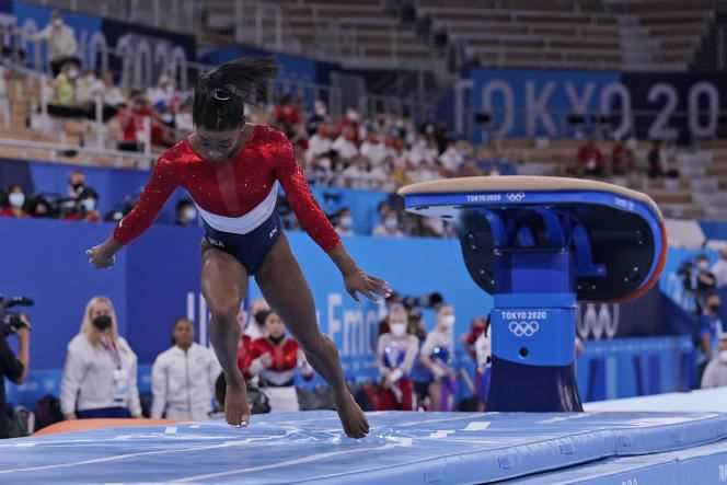 Simone Biles fouls the landing of her jump during the team gymnastics competition on July 27, 2021, in Tokyo.