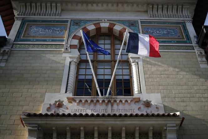 Thursday February 11, 2021, European and French flags fly at the entrance of the National School of Administration, in Paris.