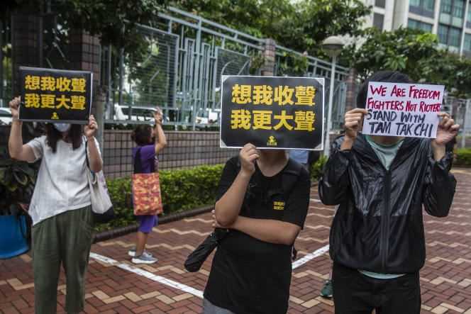 Pro-democracy supporters protest outside Fanling court in Hong Kong on September 8, 2020, as activist Tam Tak-chi appears on charges of sedition.