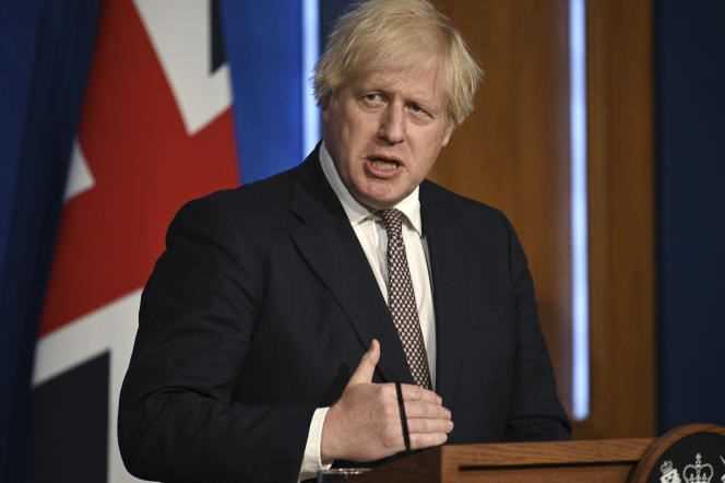 British Prime Minister Boris Johnson gives a press conference Monday July 5 in London to announce the end of health restrictions on July 19.