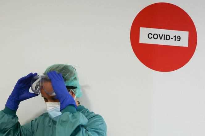 A member of hospital staff at Hospital del Mar, where an additional ward has been opened to deal with the increase in the number of patients ill with Covid-19, in Barcelona, ​​Spain, July 15, 2021.