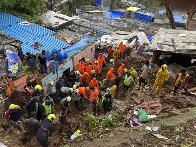 Rescue workers are looking for survivors after a wall collapsed on houses in Mumbai, India on July 18, 2021.