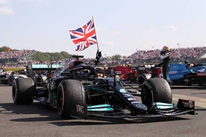 Lewis Hamilton celebrates his victory in the British Grand Prix at the Silverstone circuit on July 18, 2021.