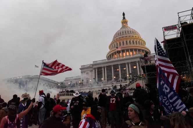 Police attempt to dislodge protesters with tear gas on Jan.6, 2021, at Capitol Hill, Washington.