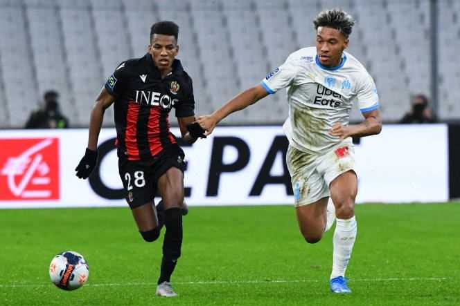 Algerian midfielder Hicham Boudaoui (left) during a match against Marseille, at the Stade Vélodrome, on February 17, 2021.