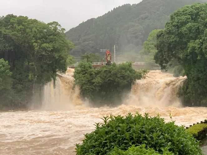 An image from social media shows the Todorokinotaki Falls in the town of Ureshino (Saga Prefecture) turned into a muddy stream on August 14, 2021.