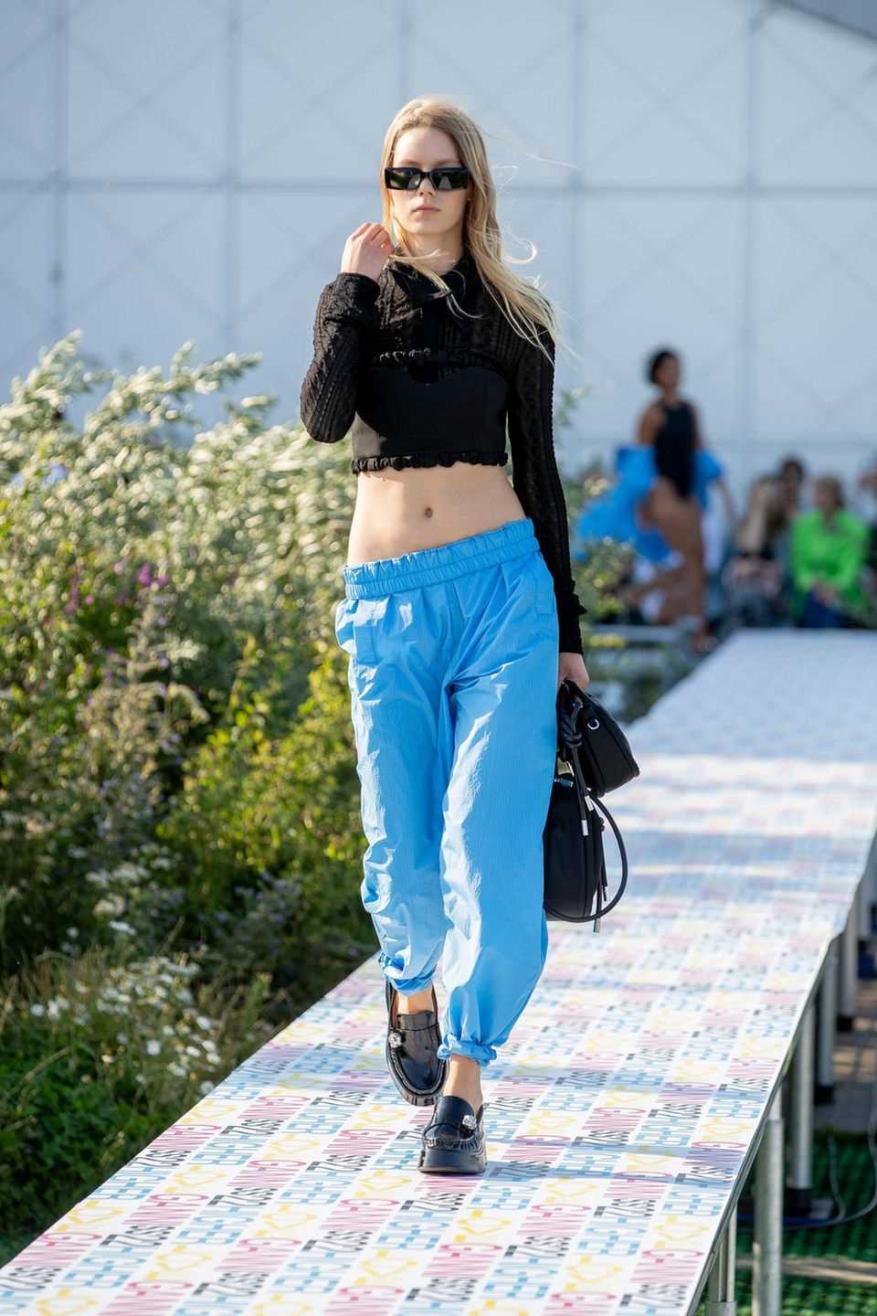GANNI shows trackpants in bright blue
