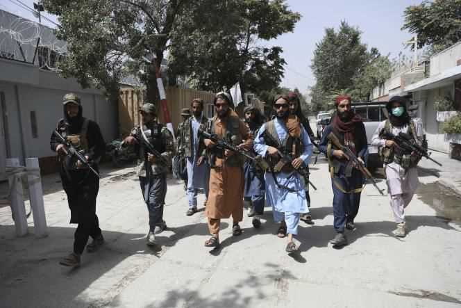 Taliban patrol the streets of Kabul on August 18.
