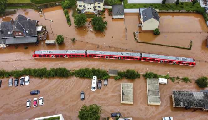 A train drowned under water, in Kordel, Germany, July 15, 2021. The rains killed 200 people in Germany and Belgium and damaged 30 billion euros.