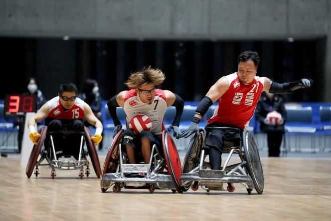 Wheelchair rugby players during a match in Tokyo on April 3, 2021.