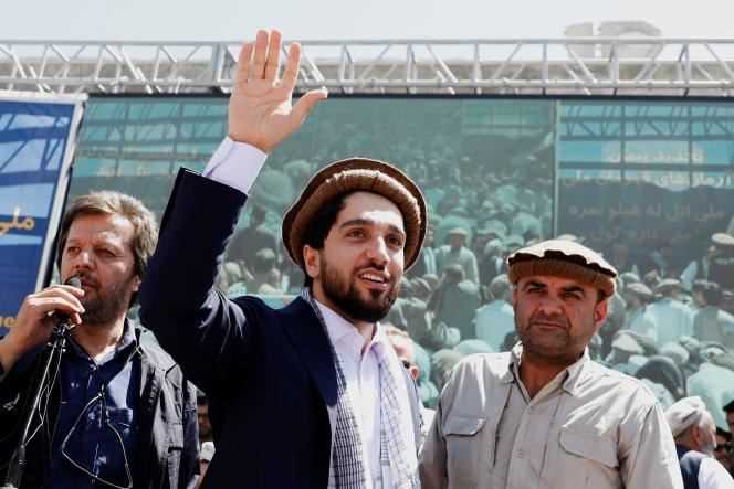 Ahmad Massoud waves to the crowd as he arrives at a rally in Bazarak, Afghanistan, September 5, 2019.