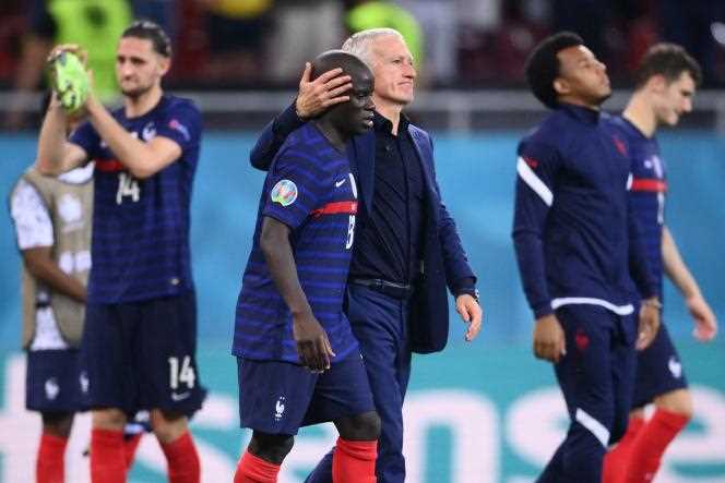 Didier Deschamps consoling his players after defeating them against Switzerland on June 28, 2021.