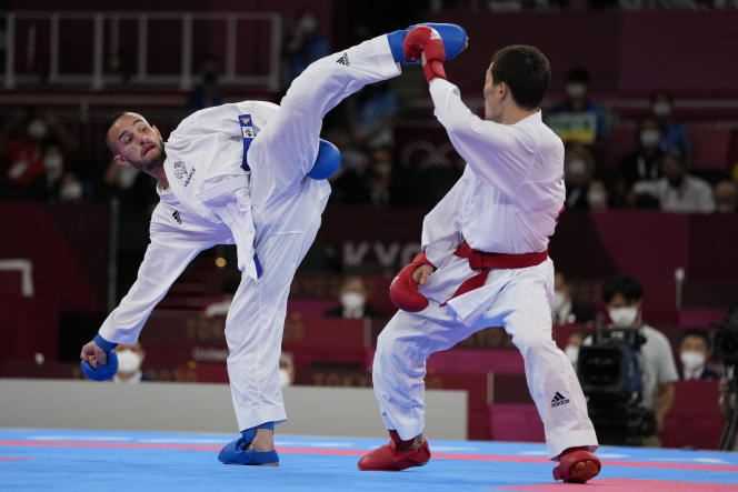 Darkhan Assadilov of Kazakhstan (right) and France's Steven da Costa (left) compete in the karate semi-final at the Olympic Games Thursday August 5, 2021 in Tokyo, Japan.