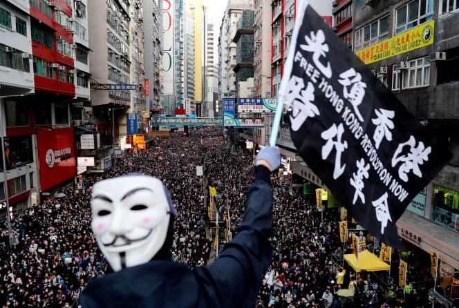 Protesters take part in a march for human rights in Hong Kong in December 2019.