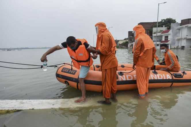 Evacuation of residents following the flooding of the Ganges in Prayagraj, Uttar Pradesh, India, August 12, 2021.