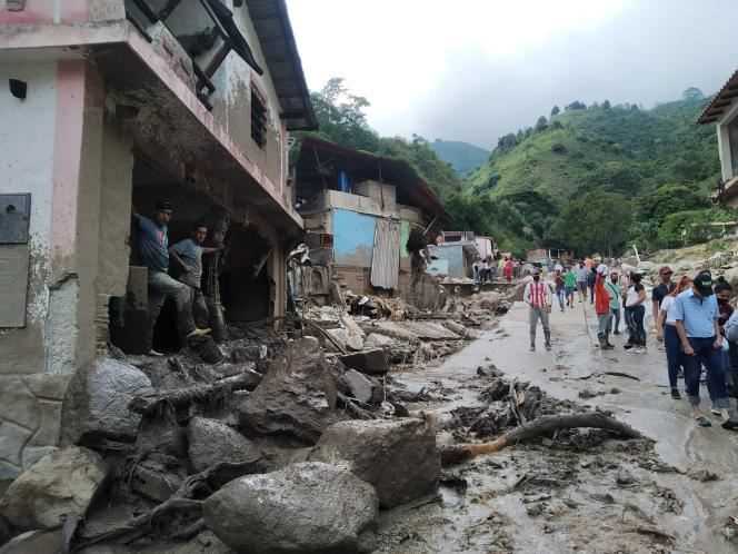 A street damaged by floods and landslides in the city of Tovar, Merida state, Venezuela on August 25, 2021.