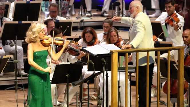 Anne-Sophie Mutter, violinist performer, with composer John Williams.