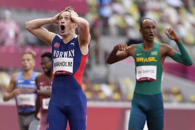 Karsten Warholm can't believe his eyes: he broke his own world record.