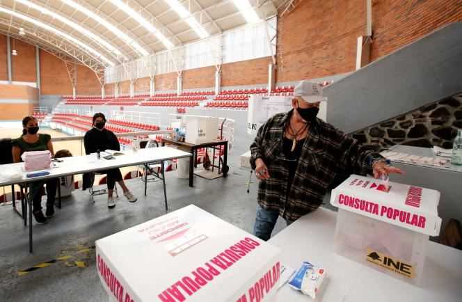 A man votes in a national referendum to judge former presidents, in Guadalajara, Mexico on August 1, 2021.