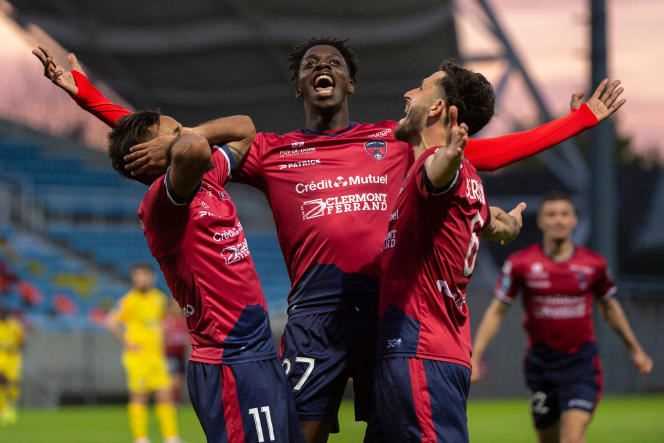 Jim Allevinah (left) celebrates his goal scored during the Ligue 2 match Clermont-Sochaux, in Clermont-Ferrand, May 8, 2021. The Auvergne team has moved up to Ligue 1 this season