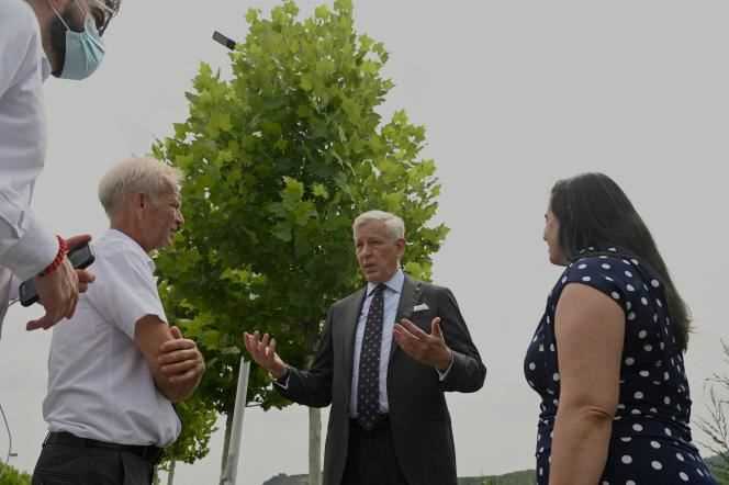 Canadian Ambassador to China Dominic Barton (center) speaks with diplomats from other countries near the detention center in Dandong City, China, August 11, 2021 after the man's conviction Canadian businessman Michael Spavor to eleven years in prison.