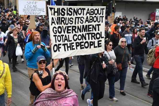 People hostile to containment demonstrate in Melbourne, Australia, Saturday, September 18.