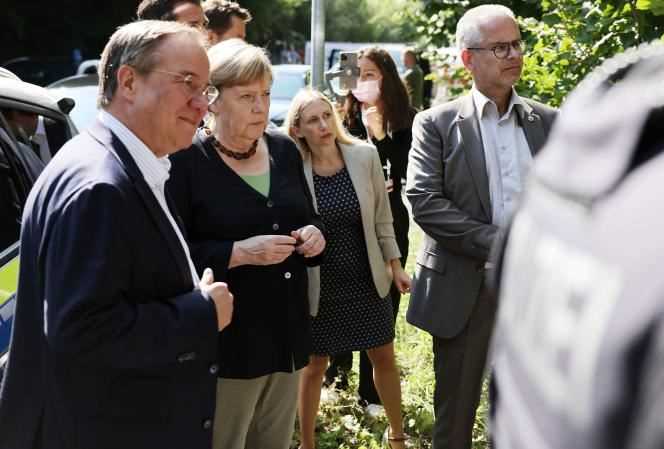 Armin Laschet and Angela Merkel visiting one of the flood affected regions in Hagen, Germany on September 5, 2021.