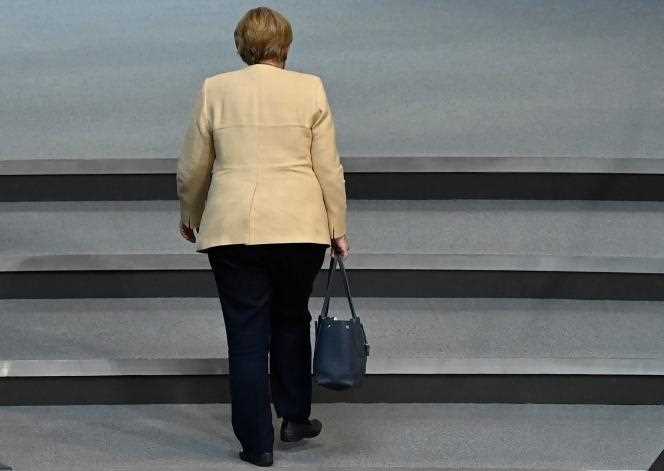 German Chancellor Angela Merkel leaves the plenary hall during a session in the Bundestag, the lower house of the German parliament, in Berlin, September 7, 2021.