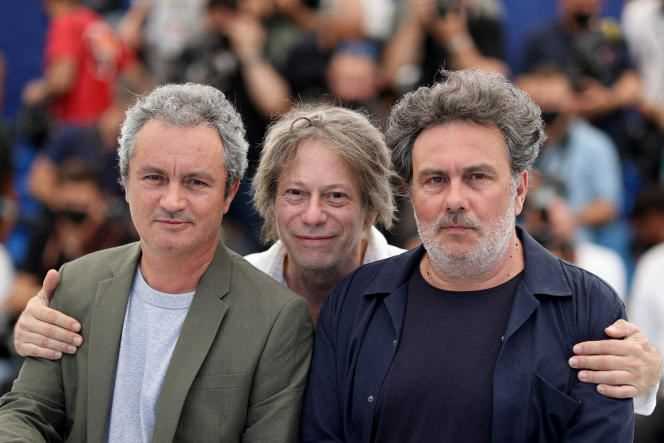 From left to right: director Jean-Marie Larrieu, actor Mathieu Amalric and director Arnaud Larrieu, July 14, 2021, during the screening of the film “Tralala” at the 74th Cannes Film Festival.
