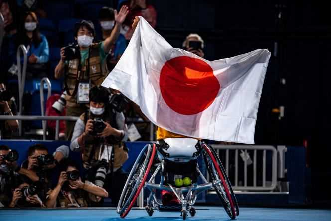 Japan's Shingo Kunieda celebrates his Olympic title in wheelchair tennis, Saturday, September 4, in Tokyo.