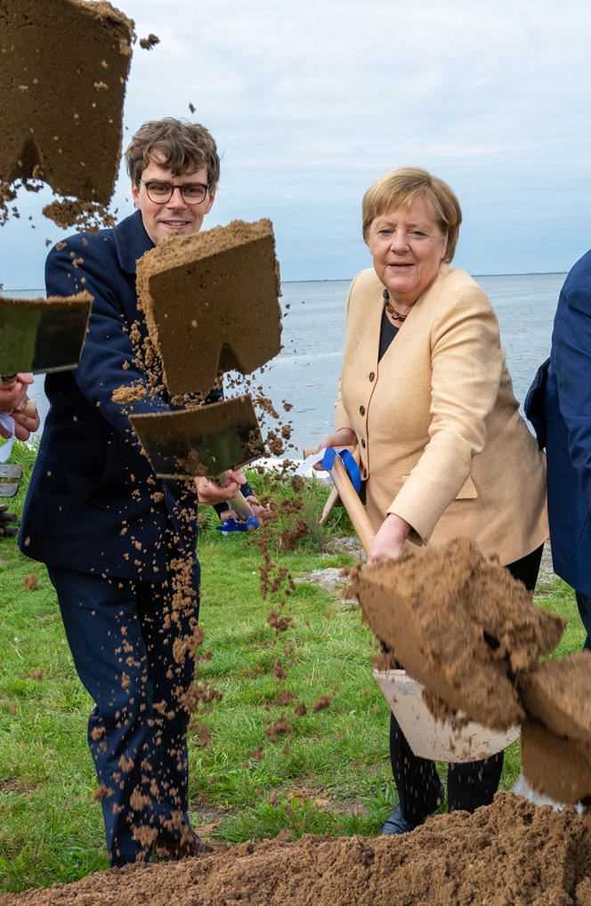 Georg Günther and Angela Merkel, on the island of Ummanz, in northeastern Germany, on September 21.