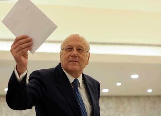 New Lebanese Prime Minister Najib Mikati presents his cabinet list at Baada Palace in Beirut on September 10.